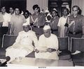 1979-07-20 Ch. Charan Singh reading letter given to him by Pesident N Sanjeeva Reddy to form government - NA33153.jpg