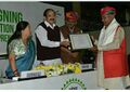 Kailash Chaudhary Receiving Award.jpg