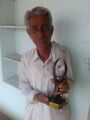 Hanumana Ram Jhuriya with Award.jpg