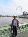 Laxman Burdak at Westminster Bridge, London Eye seen behind