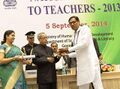 Bharat Ola receiving Rashtriya Shikshaka Award-2014 from Presdent of India