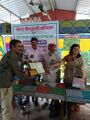 Smt. Rajesh handing over the awards and mementos to the recipients, while attending a public program over environment issue, as a Chief Guest at Jaipur.