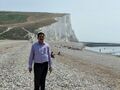 Laxman Burdak at Beach of Seven Sisters East Sussex, England, chalk cliff is seen behind, 7.7.2018